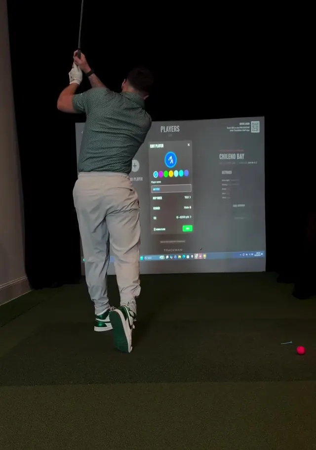 Eric in the golf simulator